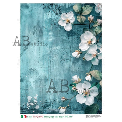 Decoupage rice paper featuring white blossoms and green leaves on a distressed turquoise background with a vintage, textured look.